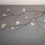 Muurschildering slaapkamer magnolia tak
