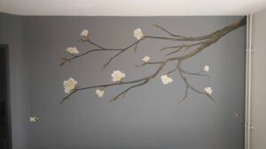 Muurschildering slaapkamer magnolia tak