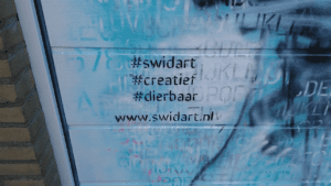 Tags van Swid'art op Garagedeur muurschildering