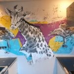 Giraffe muurschildering deventer